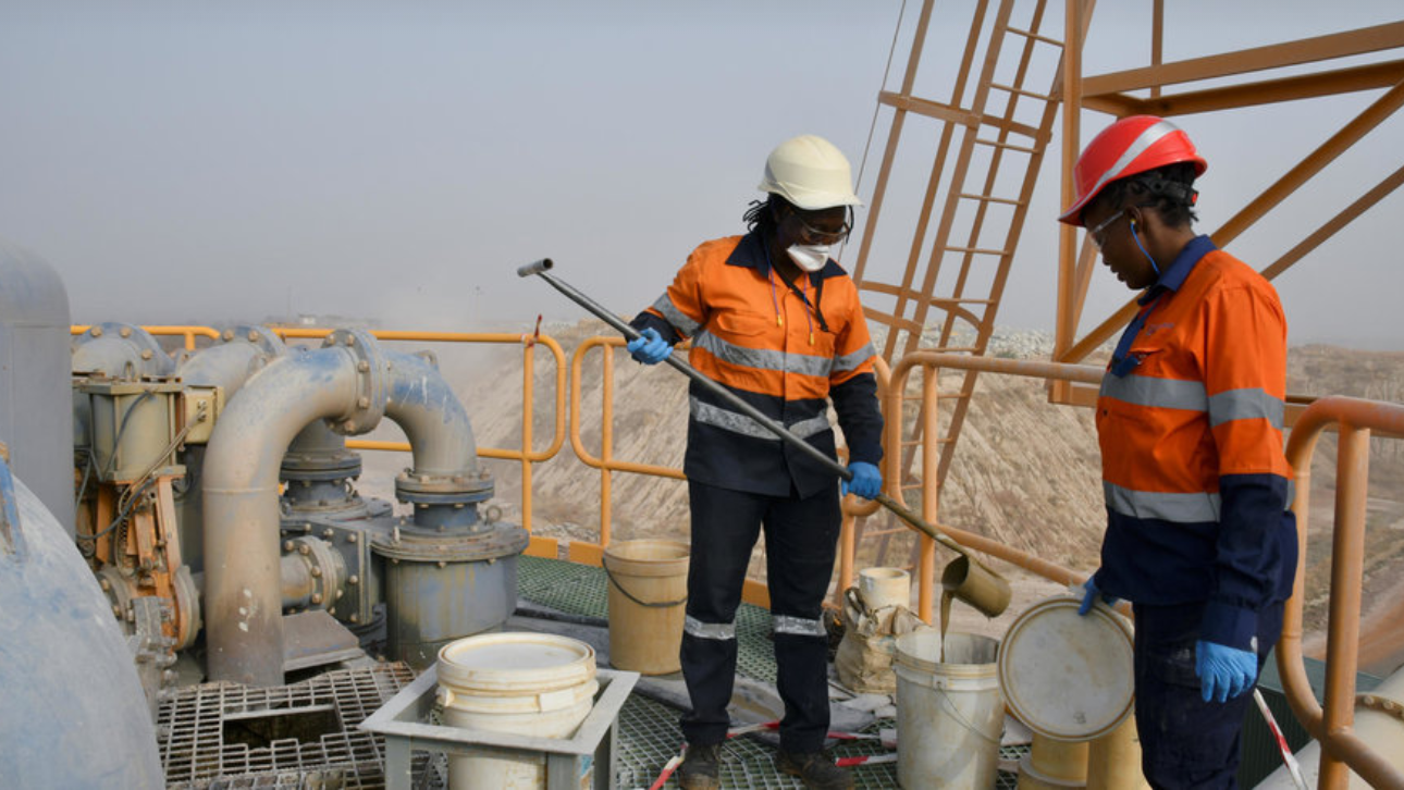 Two workers on a construction site